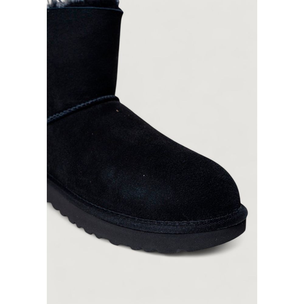 بوت الكاحل UGG من الجلد السويدي الأسود