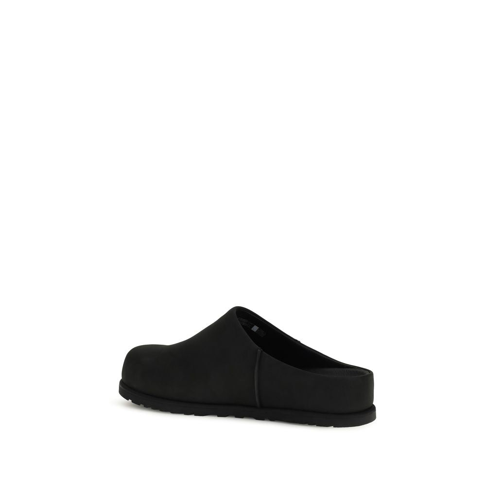 نعال UGG سوداء من جلد عجل البوس توروس